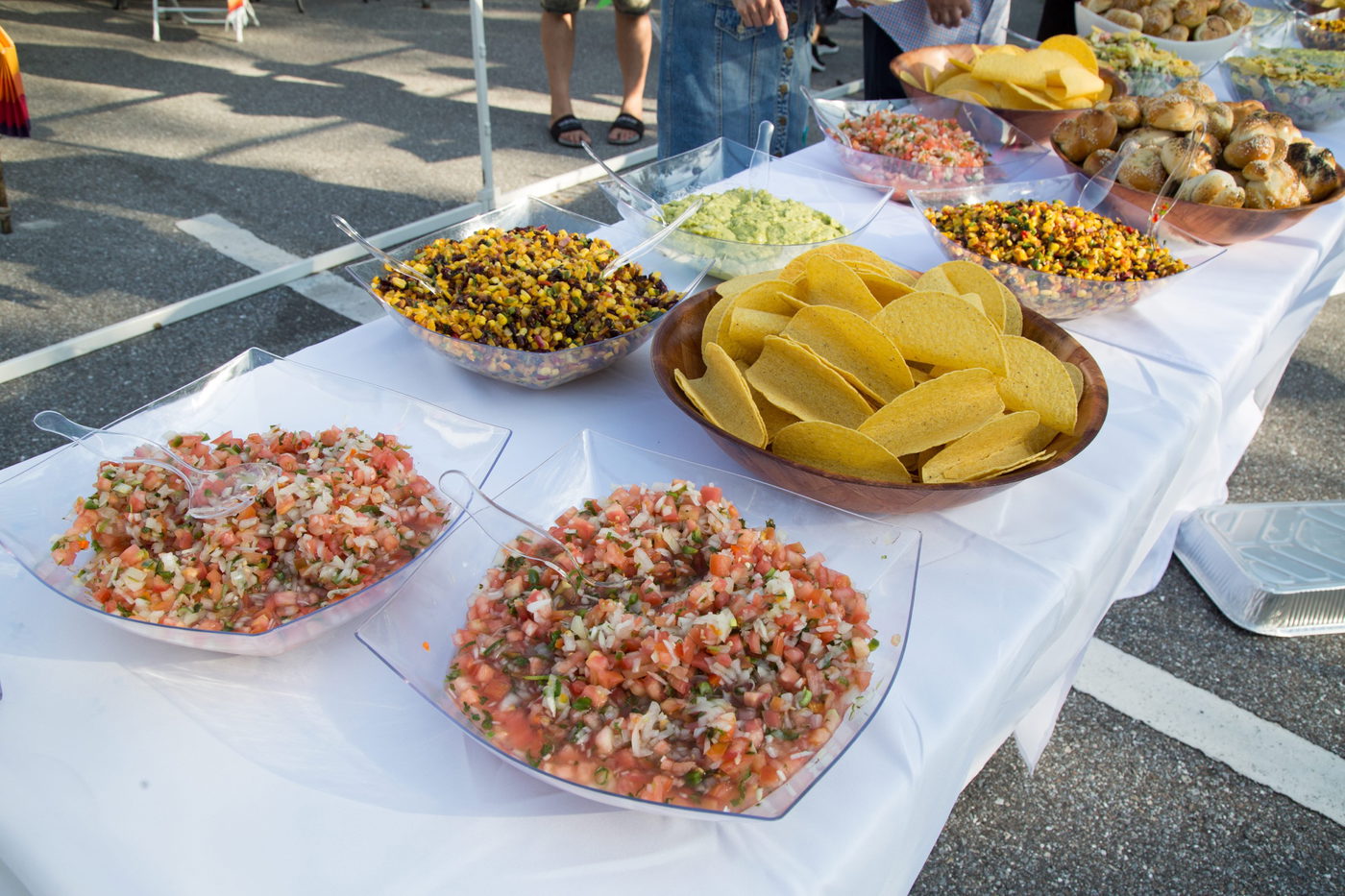 Outdoor kosher spread with salsa, guacamole and taco shells
